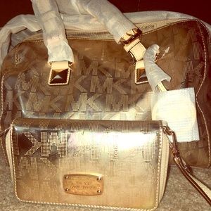 Michael Kors hand bag and clutch wallet